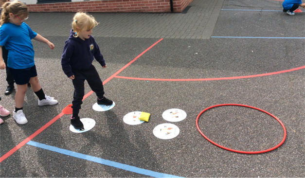 A group of children are playing on a playground.