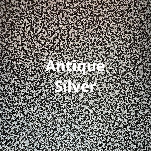 A close up of a piece of paper with the words `` antique silver '' written on it.