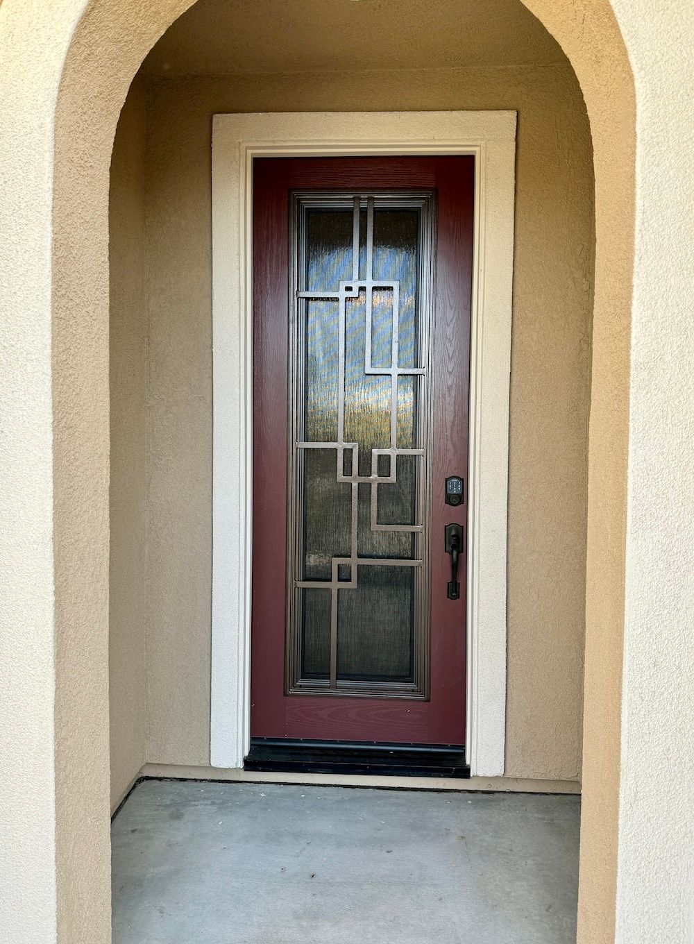 A red door with a geometric design on it