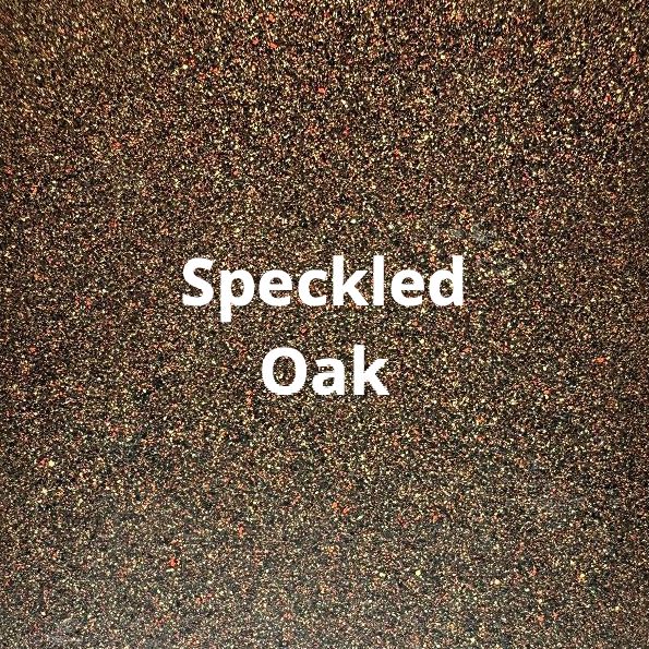 A close up of a speckled oak carpet texture.