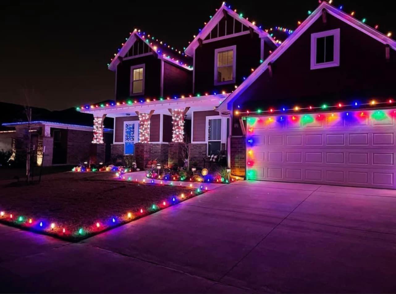 A House is decorated with Christmas Lights - Mount Washington, KY - God’s Country Outdoor Services 
