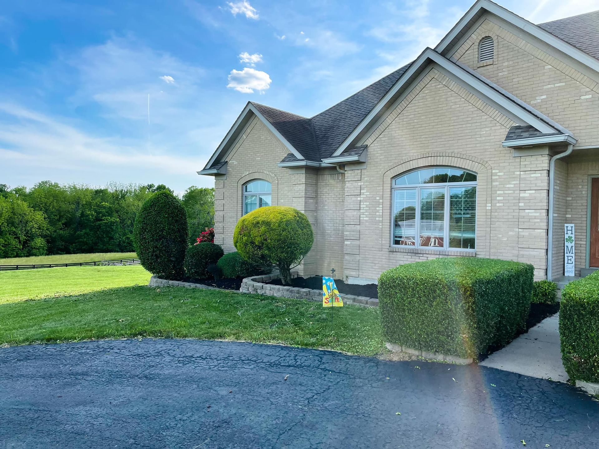A Large House with Windows and a Driveway - Mount Washington, KY - God’s Country Outdoor Services 