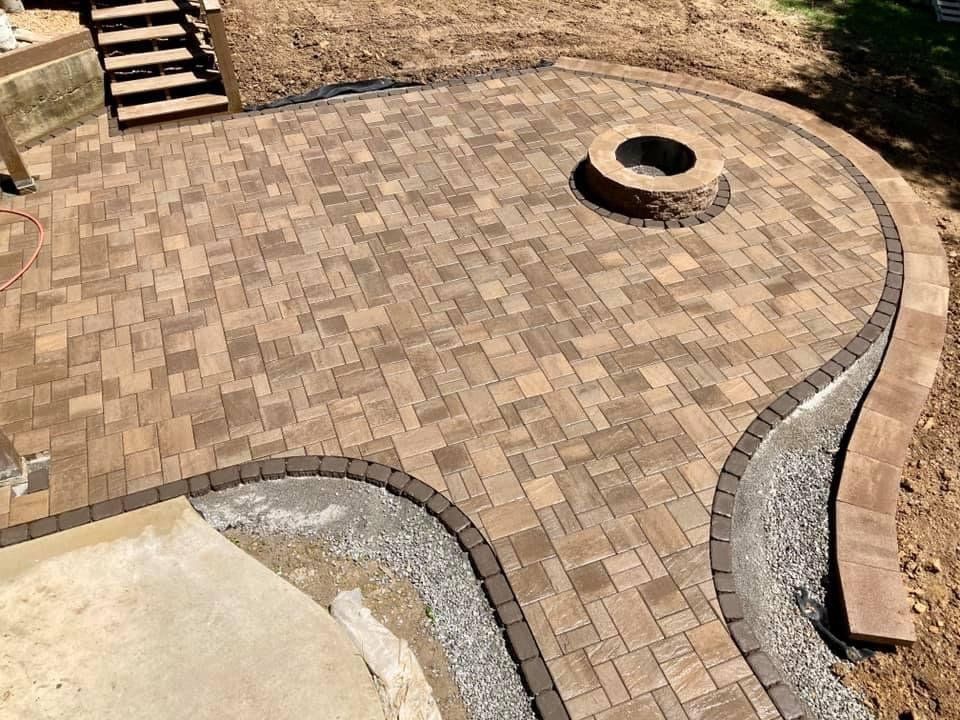 A large brick house with a car parked in front of it - Mount Washington, KY - God’s Country Outdoor Services