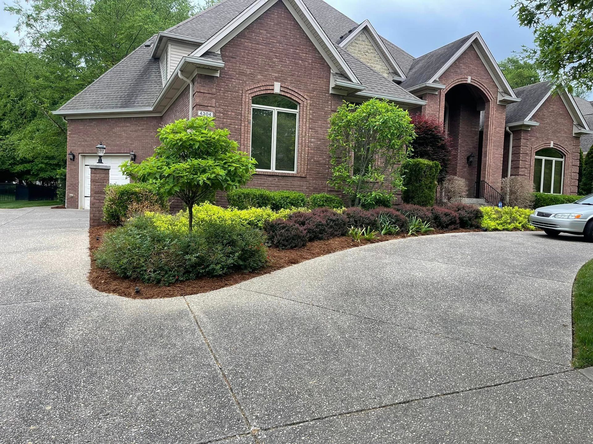 House with a lot of Plants in front - Mount Washington, KY - God’s Country Outdoor Services 