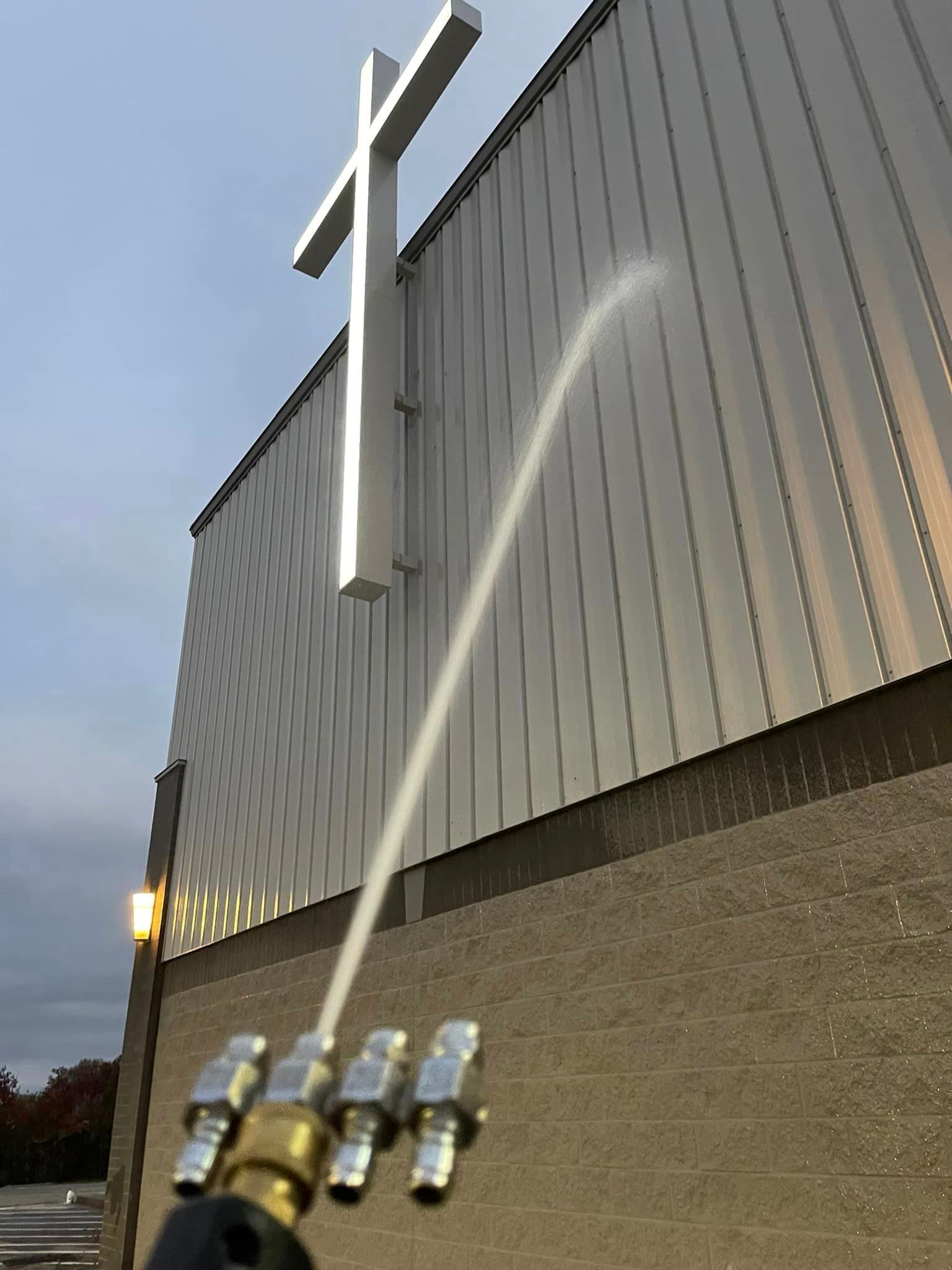 A Water Hose Spraing on a Church - Mount Washington, KY - God’s Country Outdoor Services 
