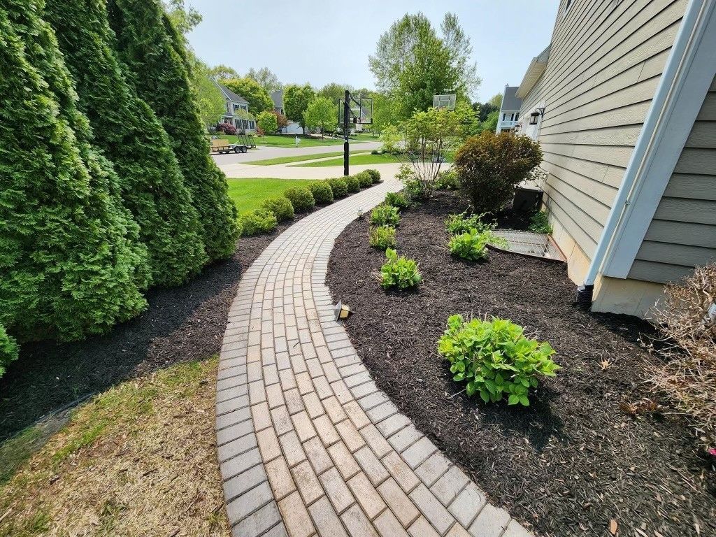 A Concrete Walkway Leading To A Porch Of A House - Mount Washington, KY - God’s Country Outdoor Services