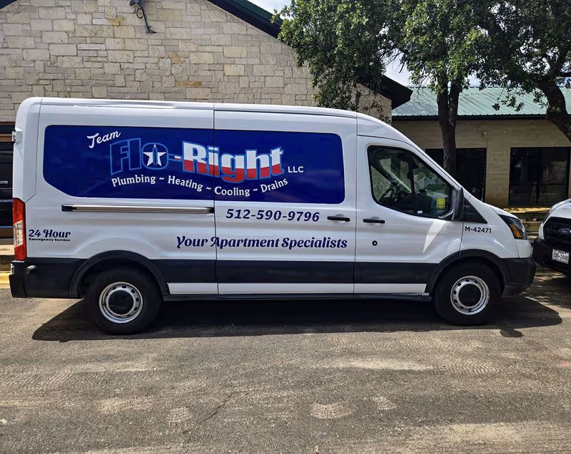 A white van with the word right on the side is parked in a parking lot.