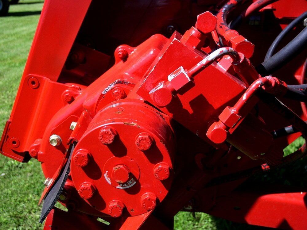 A Close up Of a Red Engine on A Tractor — Parkes Machinery Services PTY LTD in Forbes, NSW