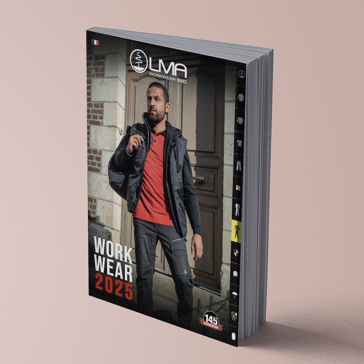 Couverture du catalogue LMA Workwear 2025 représentant un homme en tenue de travail noire devant un bâtiment en briques.