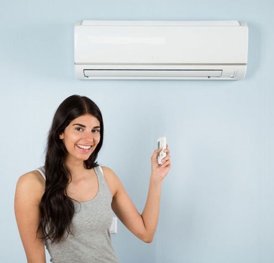 Financing Options — Happy Woman With a New AC in Salem, OR