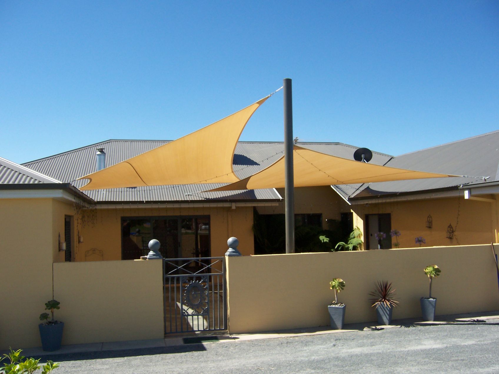 Beige Shade Sail Front Yard Of The House — Custom Blinds in Wangaratta, NSW