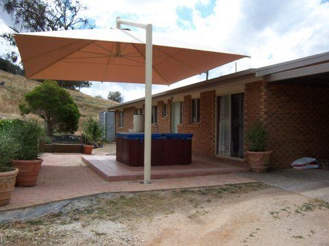 White Cantilever Umbrella Installed At The House — Custom Blinds in Yarrawonga, NSW