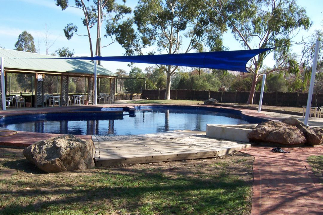 Blue Shade Sails Above The Pool — Custom Blinds in Bright, NSW