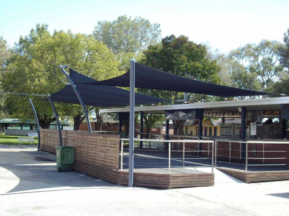 Black Shade Sails In Front Of A Restaurant — Custom Blinds in Wodonga, NSW