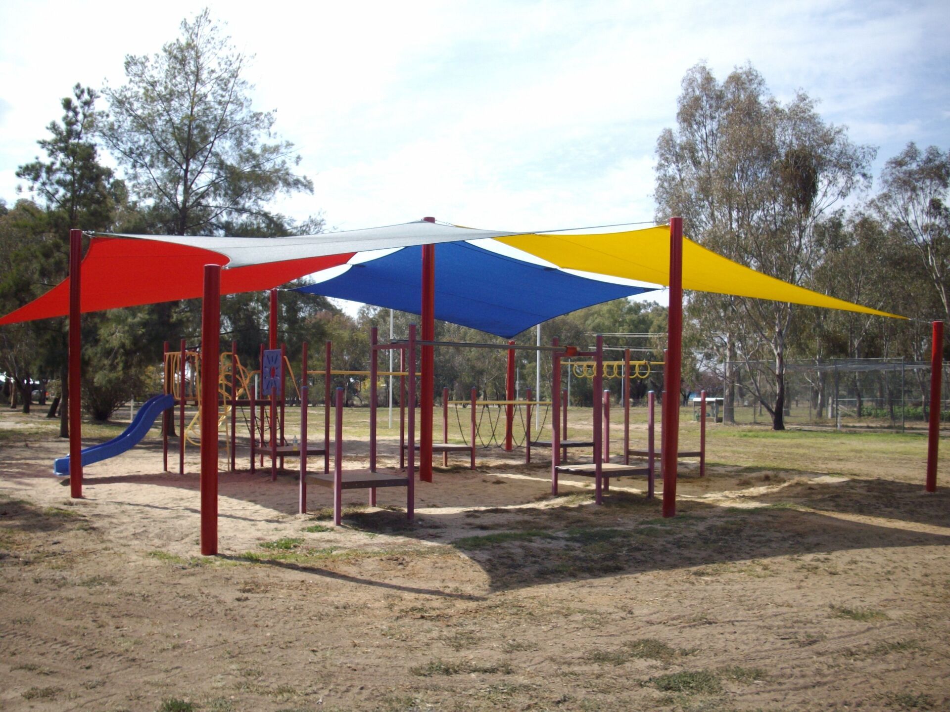 Playground With Colourful Shade Sails — Custom Blinds in the Albury Region, NSW