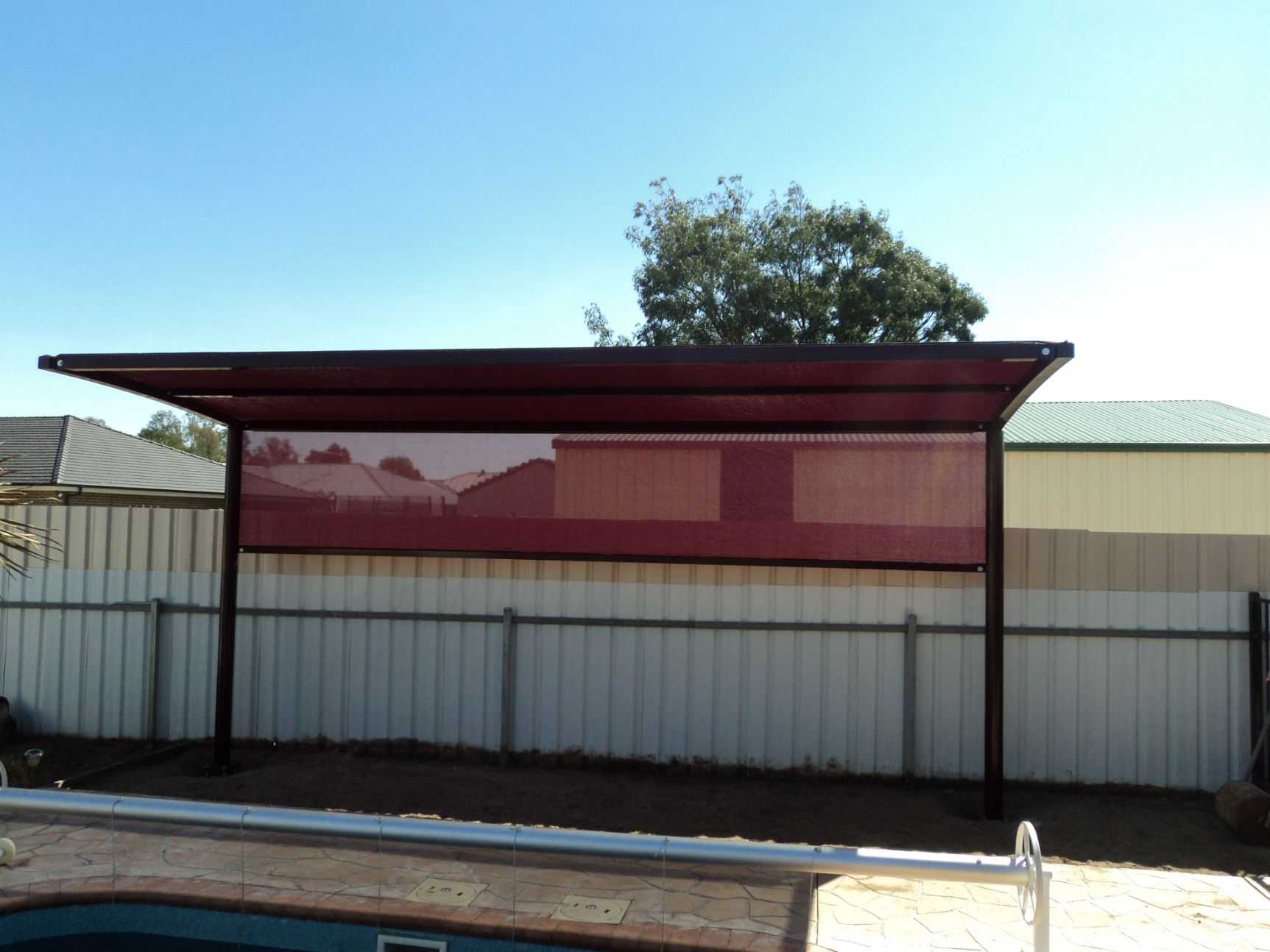 Front View Of Red Cantilever Shade Structure — Custom Blinds in Albury, NSW