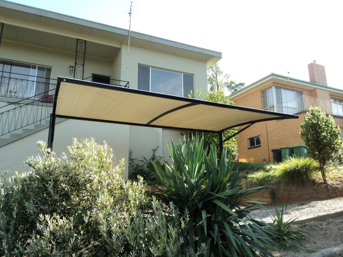 Cantilever Shades Structures Behind The Plants — Custom Blinds in the Albury Region, NSW