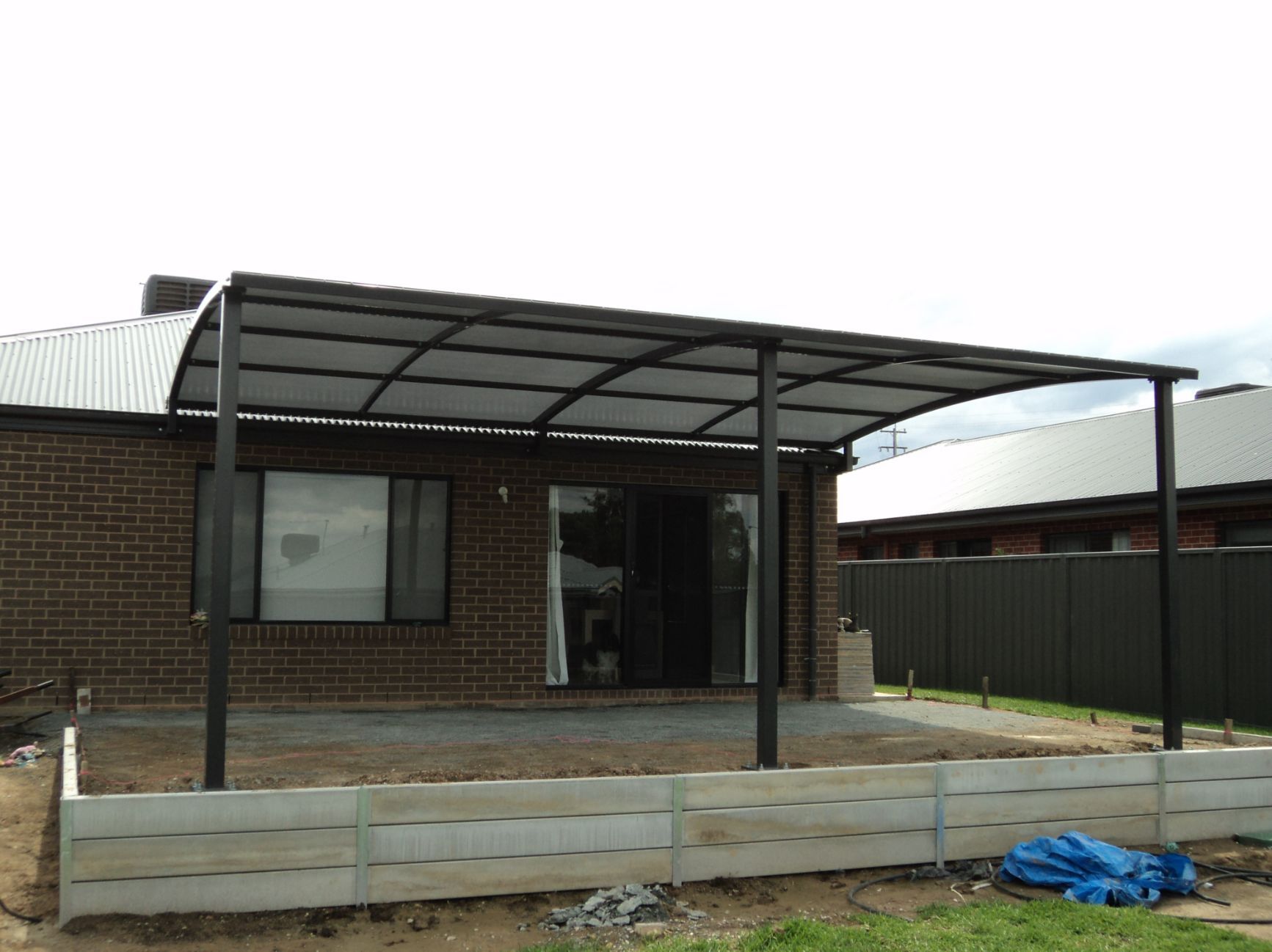 Cantilever Shade At The Backyard Of The House — Custom Blinds in Wodonga, NSW