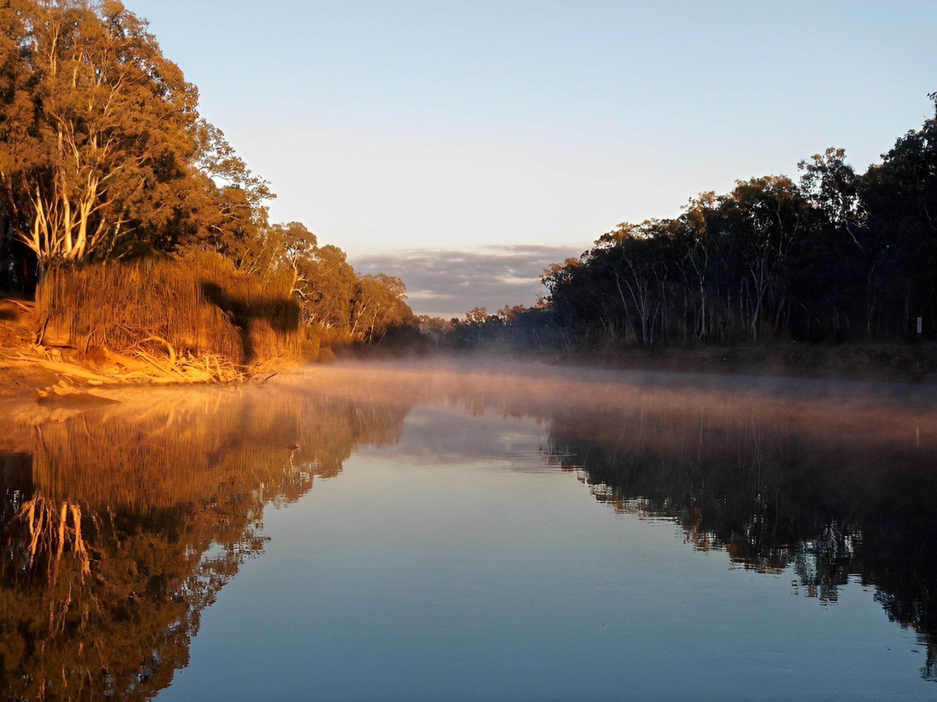 Early Morning Sunrise Glow And Rising Mist Over The Murray River — Custom Blinds in Corowa, NSW