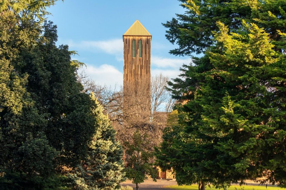 Tall Church Tower Against A Blue Sky In Wangaratta — Custom Blinds in Wangaratta, NSW