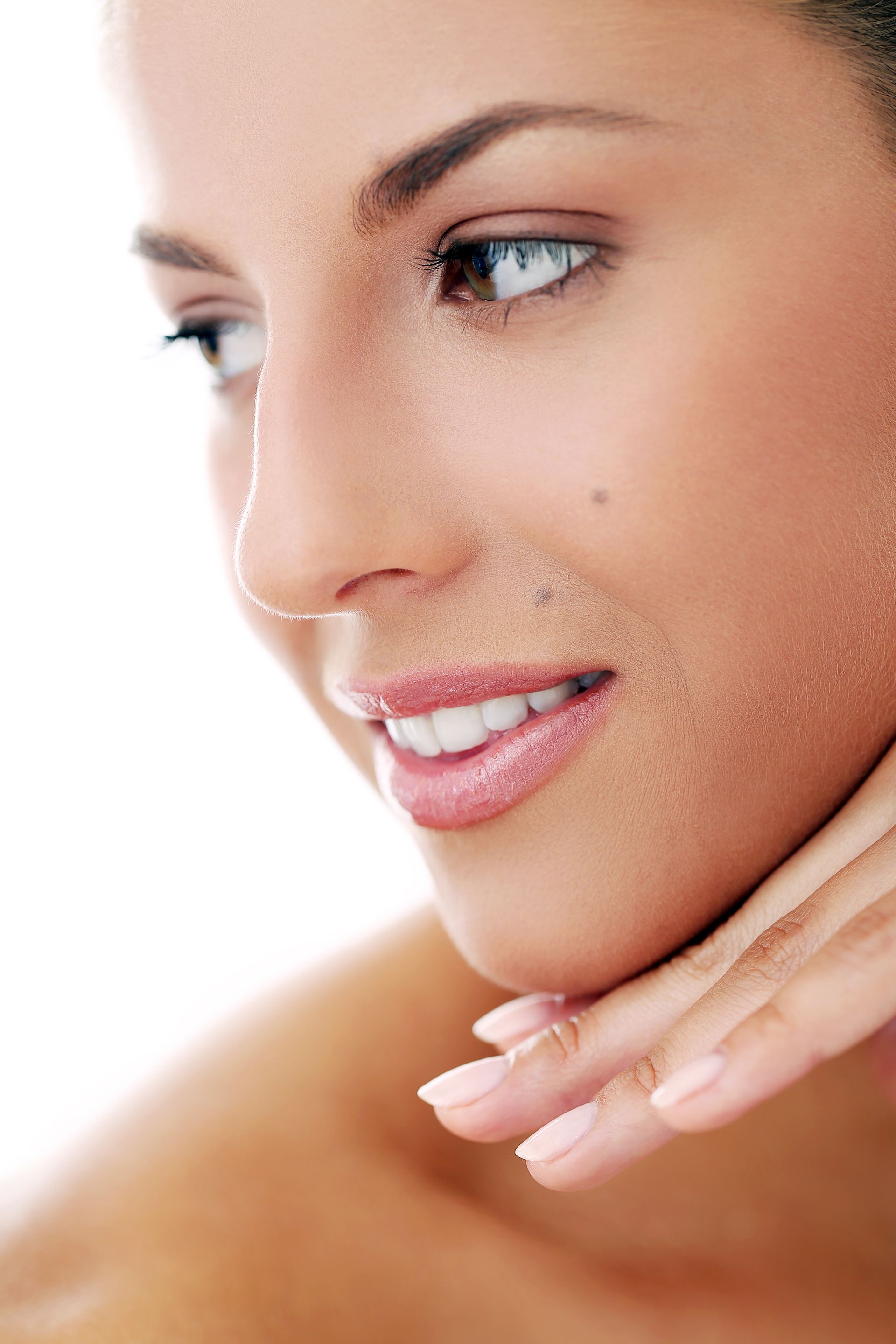 a woman is getting a facial treatment at a beauty salon .