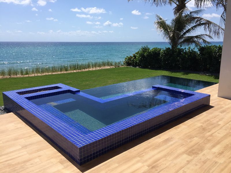 A swimming pool with a view of the ocean