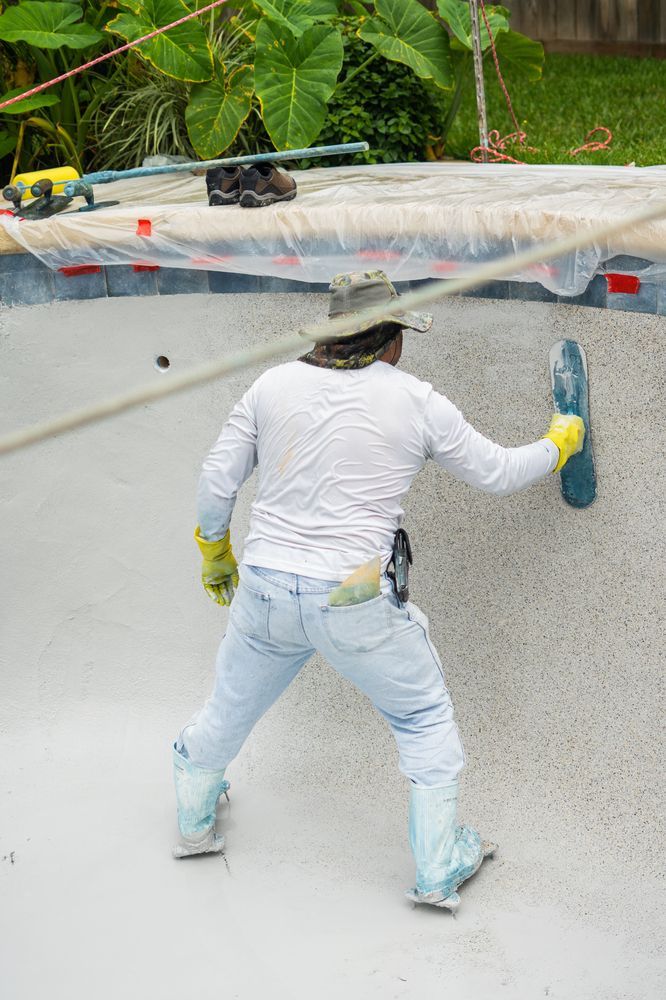 man finishing inner pool furnish