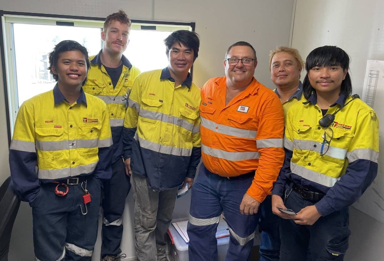 Group of Seven People Wearing High-visibility Clothing — Tincone Pty Ltd in Paget, QLD