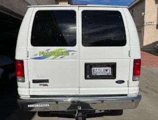 White Ford van with 