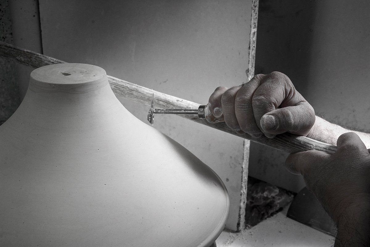 Finition du corp de chasse en porcelaine