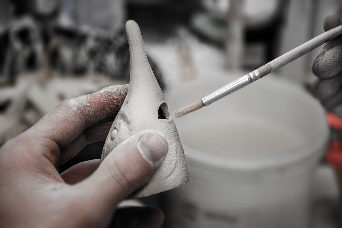 Création en porcelaine de la tête d'esturgeon