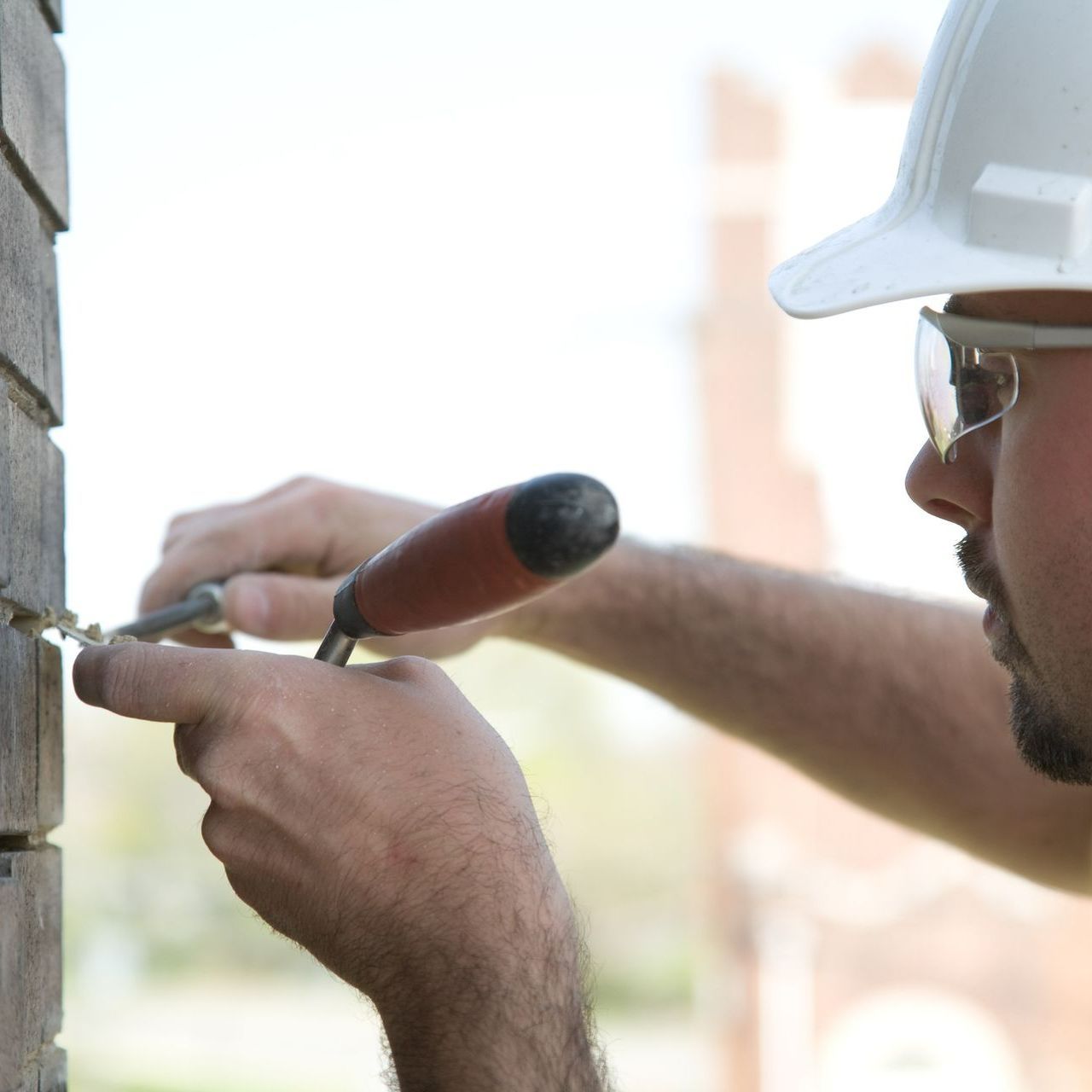 Construction Mason Pointing Brick Joints - East Canton, OH - Northeast Roof & Chimney Repair