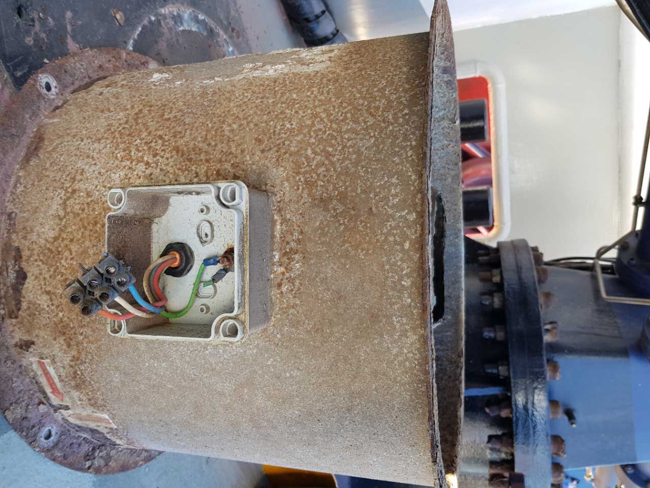 Corrosion on a fan housing due to not having mist elimination grilles installed.