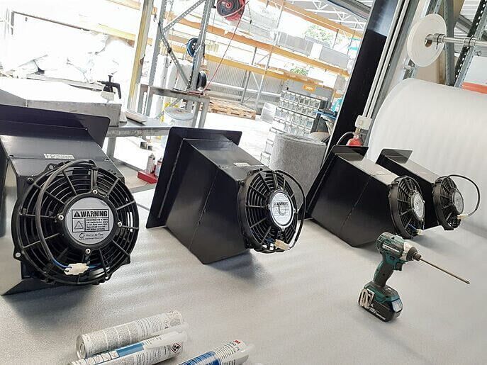 Custom designed air intake grilles with DC compact fans for Rafnar pathfinder boats.