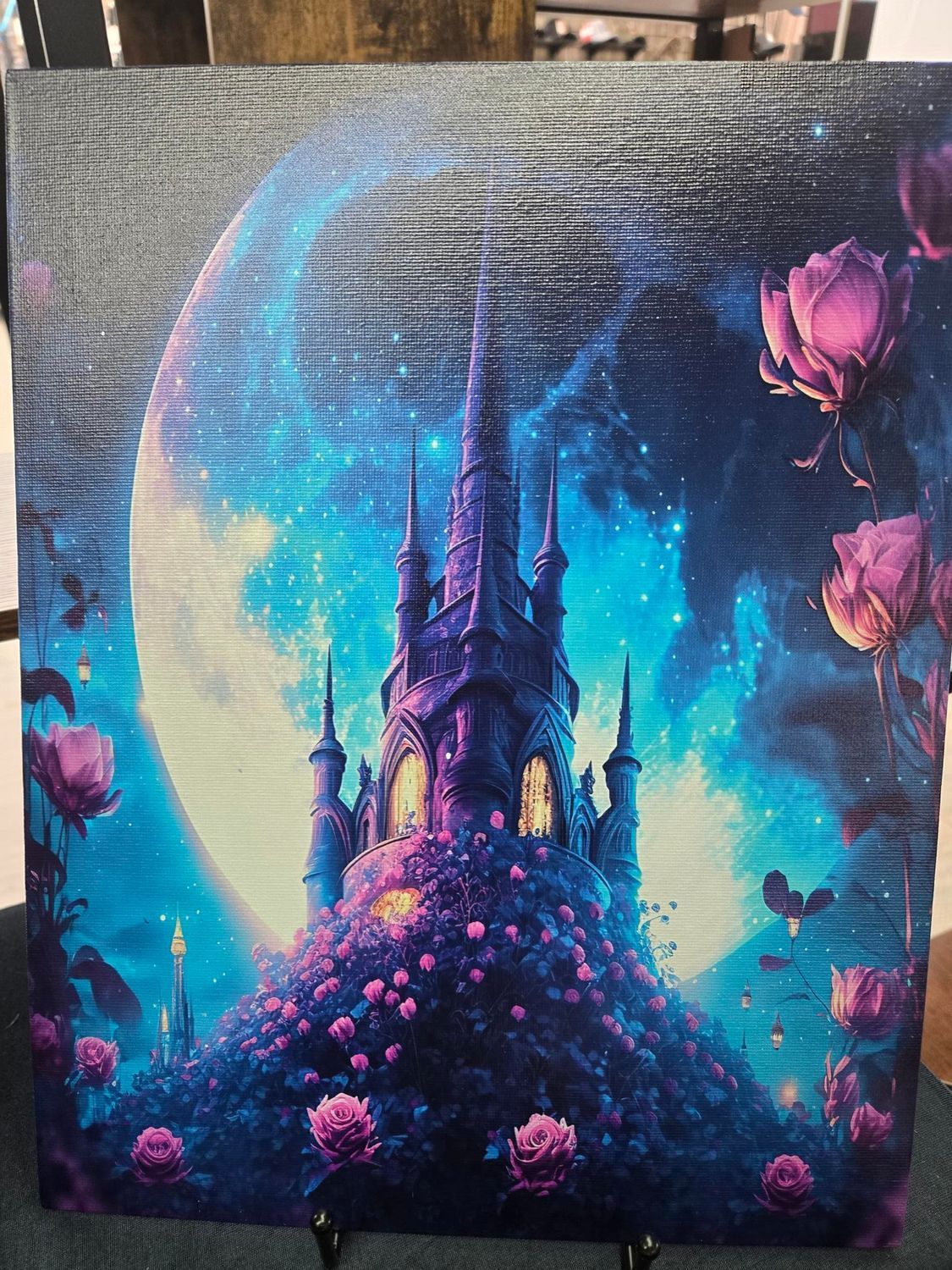 Dark castle with moon and roses, in shades of purple and blue.
