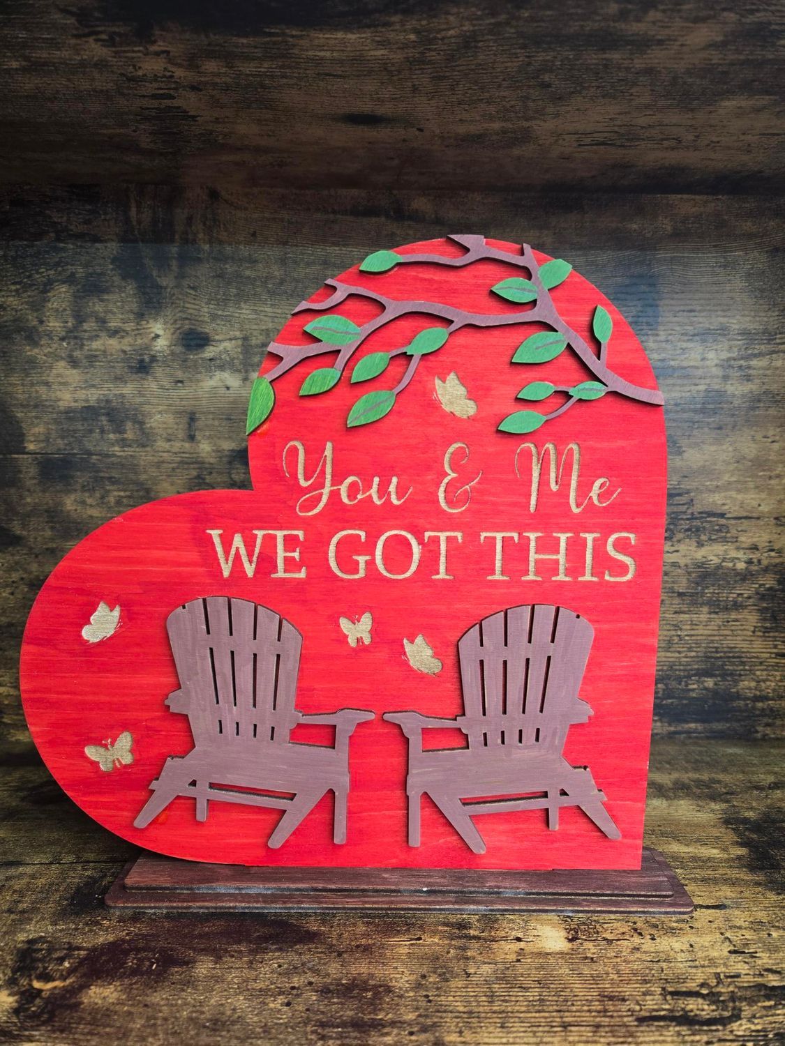 Red heart-shaped sign with 