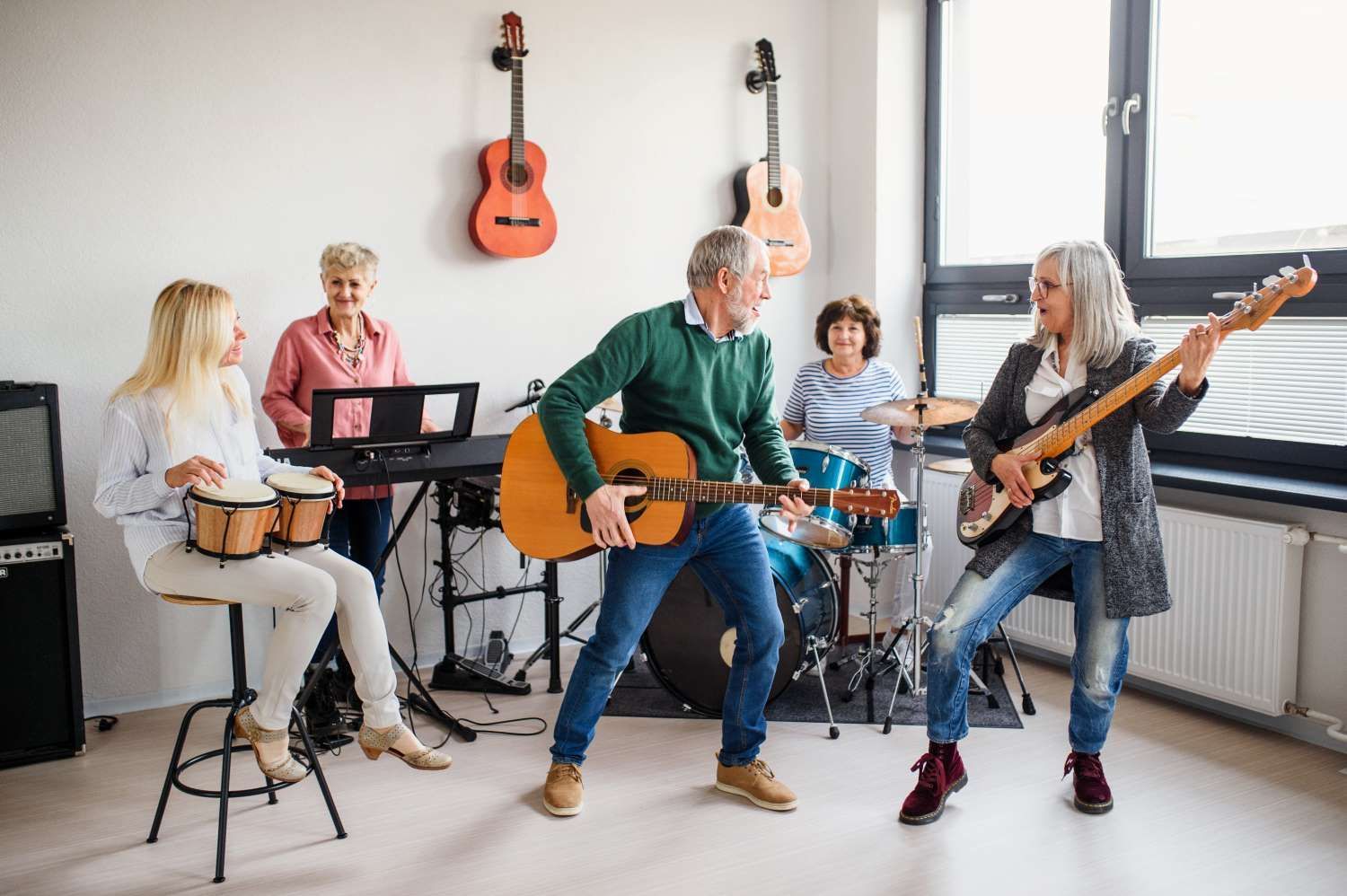 Group Of Senior People Playing Musical Instruments Indoors In Band— Eleos Support Services In Lavington, NSW