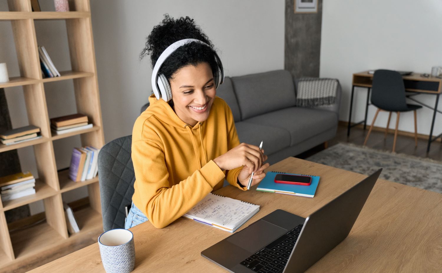 Women Student Wearing Headphones Having Virtual Education Class Meeting — Eleos Support Services In Lavington, NSW