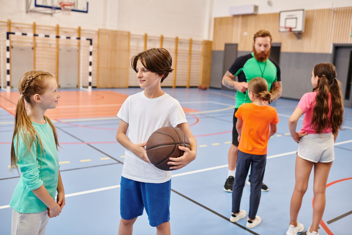 Group Of Young People Stand Around A Basketball Court — Eleos Support Services In Lavington, NSW
