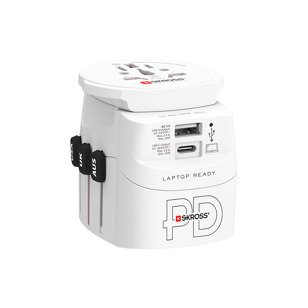 A white travel adaptor with three usb ports on a white background.