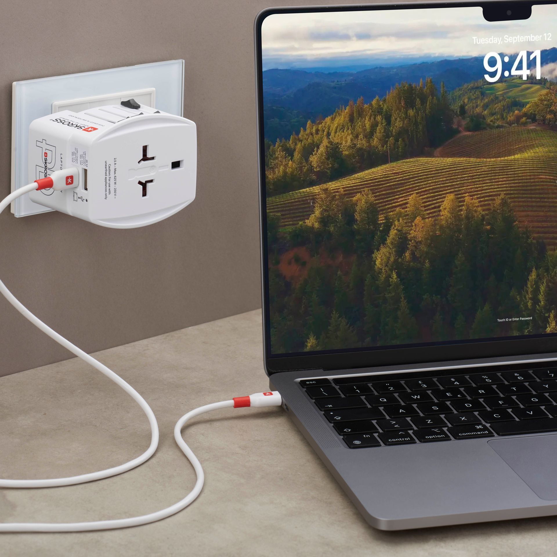 Skross 2-Pole MUV USB AC45PD Travel Adapter charging a laptop SKR-0244