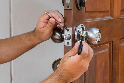 Installation and Repair — Man Installing the Door Lock in Beaver, PA