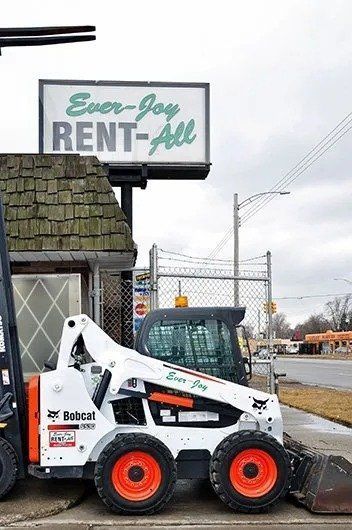 Bobcat Skid Steer and a Forklift