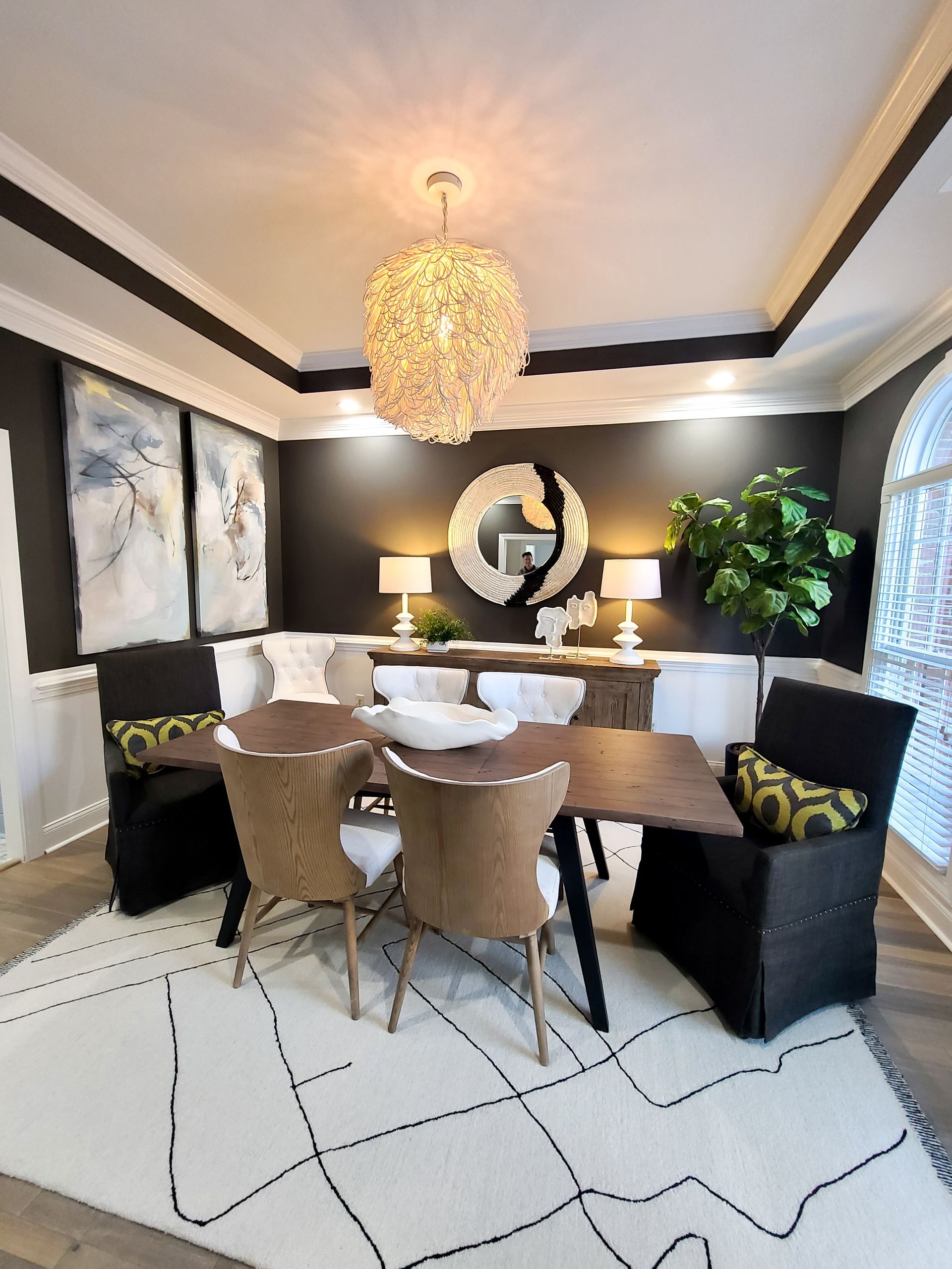 table set with 2 black chairs