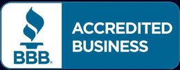 A blue sign that says accredited business on it