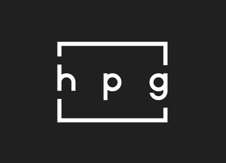 The logo for hub pen is red and gray and says `` enjoy writing ''.