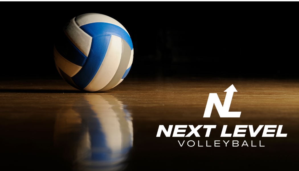 A volleyball is sitting on a wooden floor next to the next level volleyball logo.