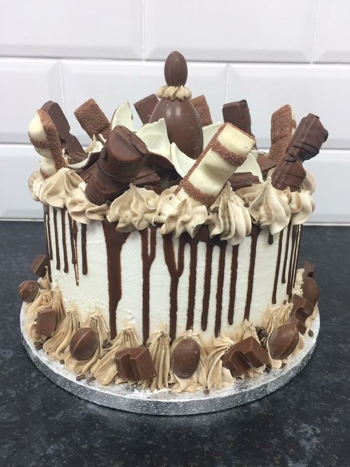 cake topped with chocolate treats