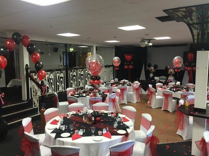 red and black balloons at a Mickey and Minnie Mouse themed wedding reception