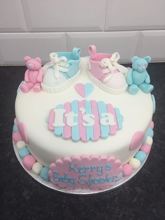 baby shower cake with booties and teddies